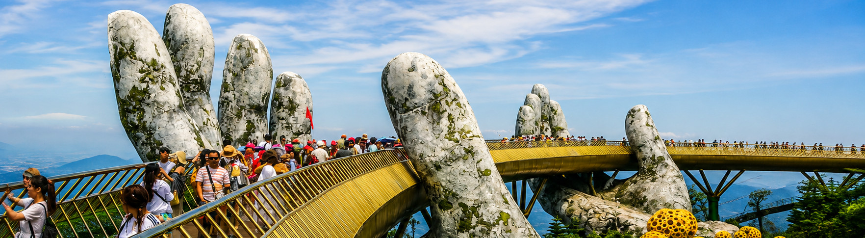 people standin on a bridge in vietnam